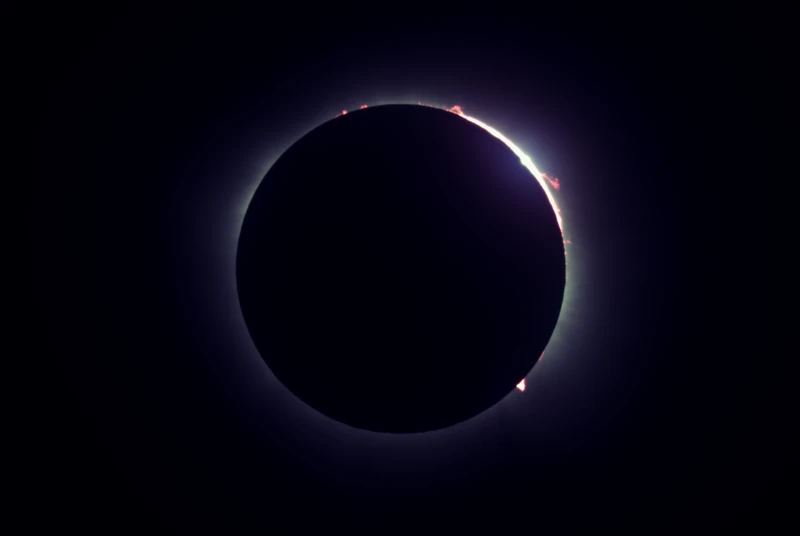 Baily's Beads: points of sunlight along the moon's edge just before totality